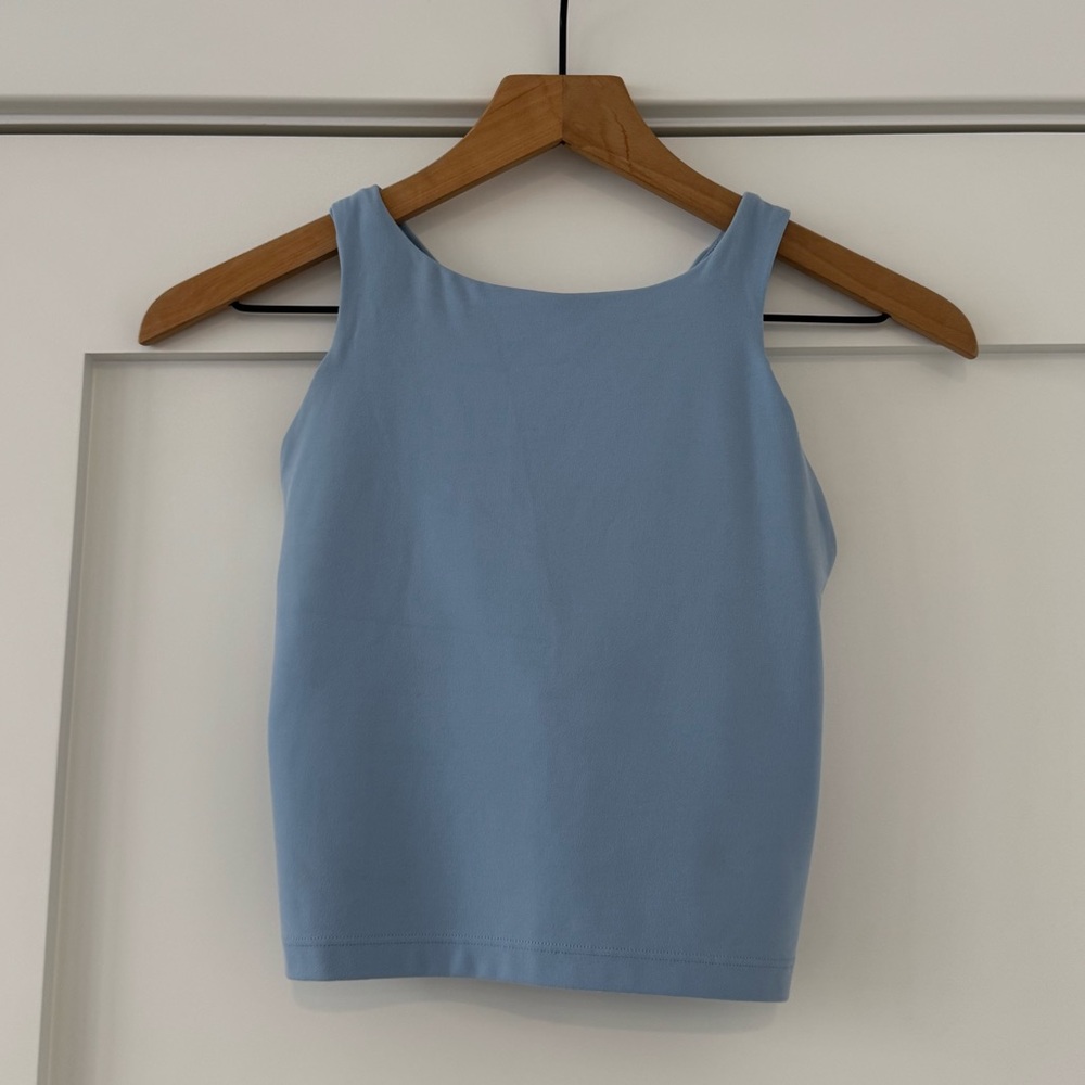 Athlete light blue sports top